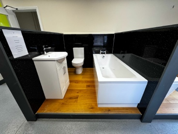 Bathroom Showroom showing bath, sink and toilet.