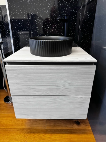 Bathroom Showroom showing raised pedestal and sink