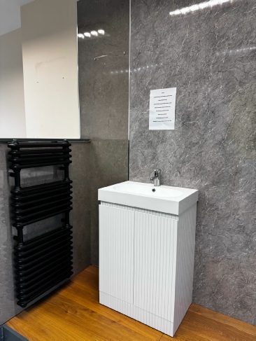 Bathroom Showroom showing pedestal and heated towel rail